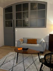 Posedenie v ubytovaní Lucas II Appartement 35 m2 Hôtel Particulier XVII ieme siècle Centre Historique Clermont-Ferrand cathédrale