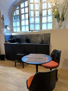 Posedenie v ubytovaní Lucas II Appartement 35 m2 Hôtel Particulier XVII ieme siècle Centre Historique Clermont-Ferrand cathédrale