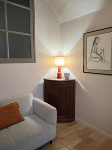 Posedenie v ubytovaní Lucas II Appartement 35 m2 Hôtel Particulier XVII ieme siècle Centre Historique Clermont-Ferrand cathédrale