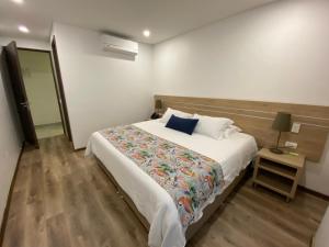 Postelja oz. postelje v sobi nastanitve EcoHub Hotel Medellin