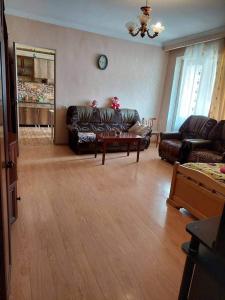 A seating area at Family Apartment in Mestia