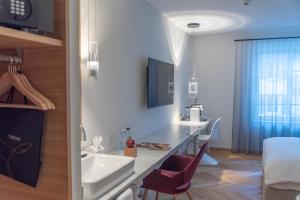 TV/Unterhaltungsangebot in der Unterkunft CASPAR Swiss Quality Hotel