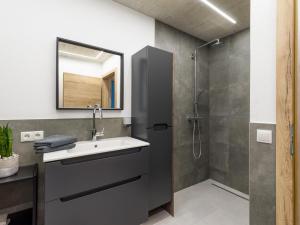Ένα μπάνιο στο Appartement Black Mountain +8 φωτογραφίες