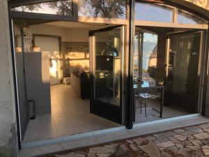 A balcony or terrace at Panoramic Room in the vineyard,stunning views of lake and Alps