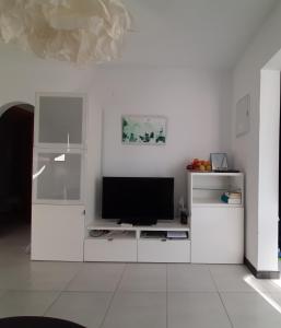 A television and/or entertainment centre at Pink Lake