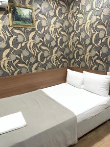 Hotel Bonjour Butovoにあるベッド