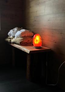 an orange pumpkin sitting on a table in a room at Baita Alpenrose in Ugovizza