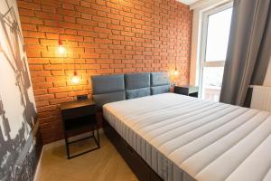 Posteľ alebo postele v izbe v ubytovaní Rent40 Apartamenty Aura 2 Gdańsk Old Town