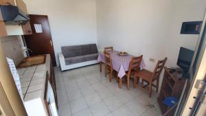 Μια τηλεόραση ή/και κέντρο ψυχαγωγίας στο Appartamenti Cala Salina