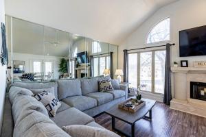 a living room with a couch and a fireplace at B 32-1 Spacious Villa Close to Pool in Branson