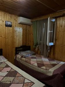 Postel nebo postele na pokoji v ubytování Guest House Yana