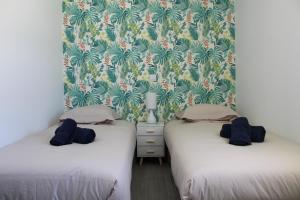 Posteľ alebo postele v izbe v ubytovaní Gîte Lou, Gîte famille et bien être avec jacuzzi