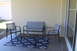 Posedenie v ubytovaní Gîte Lou, Gîte famille et bien être avec jacuzzi