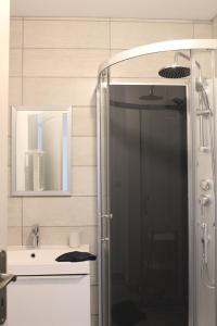 Kúpeľňa v ubytovaní Gîte Lou, Gîte famille et bien être avec jacuzzi