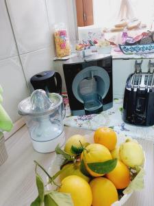 A kitchen or kitchenette at Butterfly Appartamento