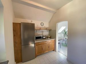 Kuchyň nebo kuchyňský kout v ubytování Waldblickwohnung mit schöner Terrasse und Kamin