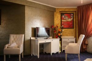 TV a/nebo společenská místnost v ubytování Hotel Kotva