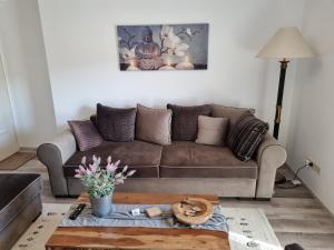 Posezení v ubytování Wohlfühl-Appartement Bergsee FAMILY - am Wildsee - SUP und Schlitten for free