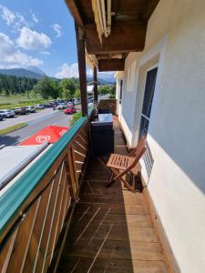 Balkón nebo terasa v ubytování Wohlfühl-Appartement Bergsee FAMILY - am Wildsee - SUP und Schlitten for free