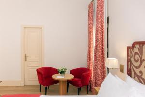 Posteľ alebo postele v izbe v ubytovaní Casa Romana Hotel Boutique