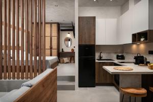 a kitchen with a sink and a counter in a room at KOEV slow living in Tsikalariá