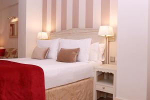 Posteľ alebo postele v izbe v ubytovaní Casa Romana Hotel Boutique