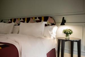Posteľ alebo postele v izbe v ubytovaní Casa Romana Hotel Boutique