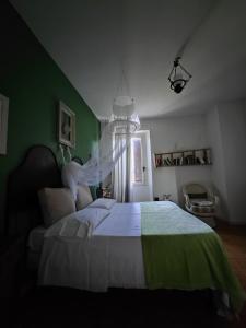 Postel nebo postele na pokoji v ubytování B&B LaMaGia di Corte Moronati