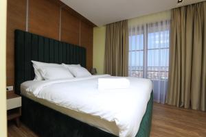 Postel nebo postele na pokoji v ubytování Hotel Castello