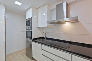 Kuchyňa alebo kuchynka v ubytovaní Luxury Apartment City Centre
