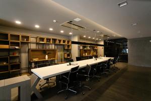 a large room with a long table and chairs at VN Capote Valente 712 no coração de São Paulo in Sao Paulo +21 photos