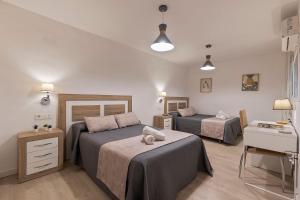 Posteľ alebo postele v izbe v ubytovaní Luxury Apartment City Centre