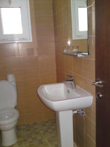Koupelna v ubytování Plaza Hotel