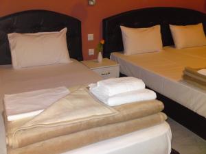 Postel nebo postele na pokoji v ubytování Plaza Hotel