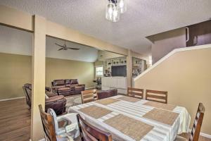 a dining room with a table and a couch at Family Retreat about 1 Mi to Hill Country Mile! in Boerne