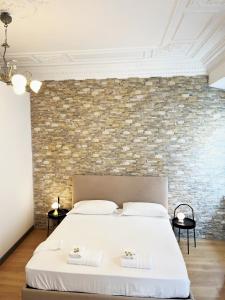 A bed or beds in a room at Pantheon Rome Relais