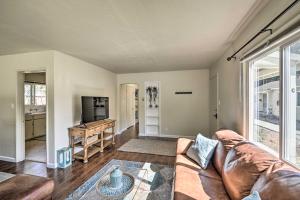 a living room with a couch and a table at Bay Area Apt about 3 Mi to Downtown Mountain View in Mountain View