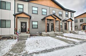 a house with snow on the ground in front of it at Modern Mountain Escape Near Slopes, Lakes and Trails in Eden