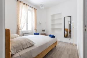 Posteľ alebo postele v izbe v ubytovaní LB Vacation Rentals I Beautiful City Center & Renovated Duplex Minutes from Beaches & Palais