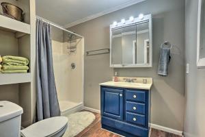 a bathroom with a blue sink and a toilet at Hike On-Site Classic Cabin Nature Retreat in Glens +27 photos