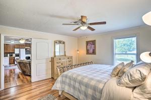 a bedroom with a bed and a ceiling fan at Sebring Condo with Game Room Less Than 13 Mi to Raceway in Sebring