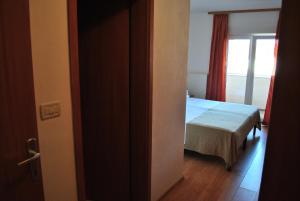 Postel nebo postele na pokoji v ubytování Guesthouse Promenade