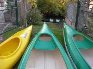 a group of three kayaks on a play set at Gîte Damvix, 4 pièces, 6 personnes - FR-1-426-147 in Damvix