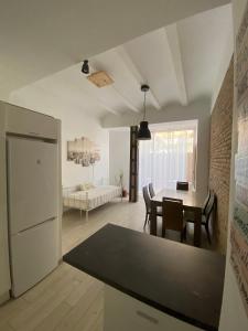 Posteľ alebo postele v izbe v ubytovaní VALENCIA RENT APARTS MILAGROSA 1