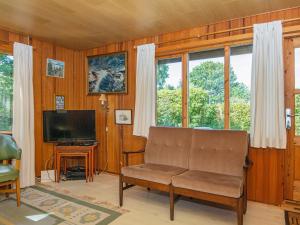 TV a/nebo společenská místnost v ubytování Holiday home Grenaa XLIV