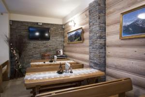 TV a/nebo společenská místnost v ubytování U Gruloka