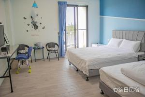 Postel nebo postele na pokoji v ubytování Chikubi Homestay
