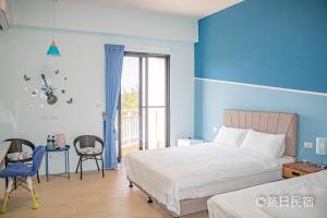 Postel nebo postele na pokoji v ubytování Chikubi Homestay