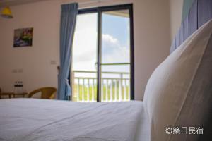 Postel nebo postele na pokoji v ubytování Chikubi Homestay