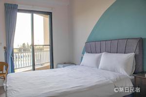 Postel nebo postele na pokoji v ubytování Chikubi Homestay